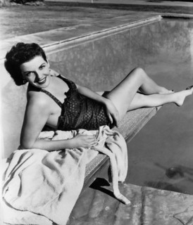 Jane RUSSELL in a swimsuit at the swimming pool, undated