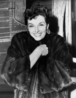 Jane RUSSELL in fur coat at the airport, London 1954