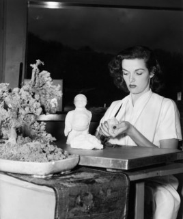 Jane RUSSELL makes a clay sculpture, undated