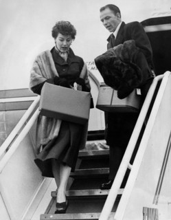 Frank SINATRA with wife Ava GARDNER at London airport, 1952