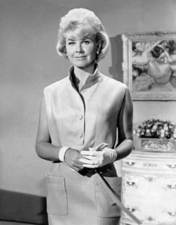 Doris DAY in a sleeveless dress and white gloves