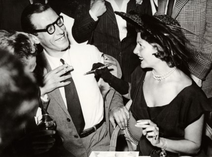 Rita HAYWORTH gives autograph