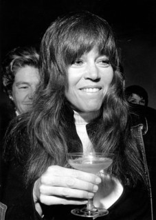 Jane FONDA, portrait with champagne glass