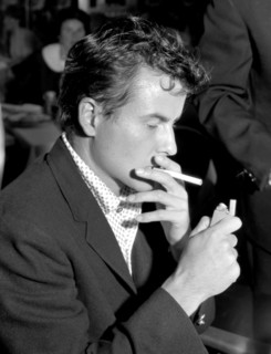 Horst BUCHHOLZ lighting a cigarette, Essen 1965