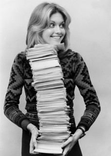 Olivia NEWTON-JOHN with ballot papers, London 1974