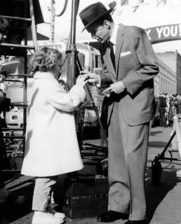 Frank SINATRA gives an autograph