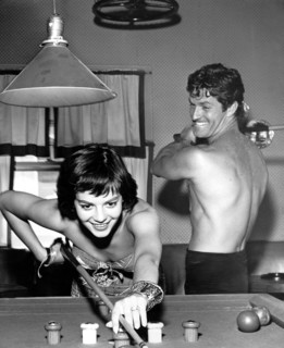 Natalie WOOD and Hugh O'BRIAN playing a game of billiards