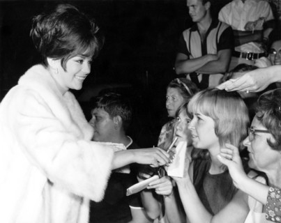Natalie WOOD gives fans autographs