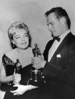 Simone SIGNORET and Charlton HESTON after the Oscars in 1960