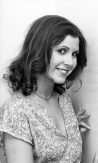 Carrie FISHER with "Star Wars" figure 1980