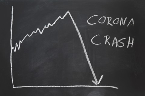 corona crash - hand-drawn graph on chalkboard showing stock market collapse or financial economy crisis caused by coronavirus
