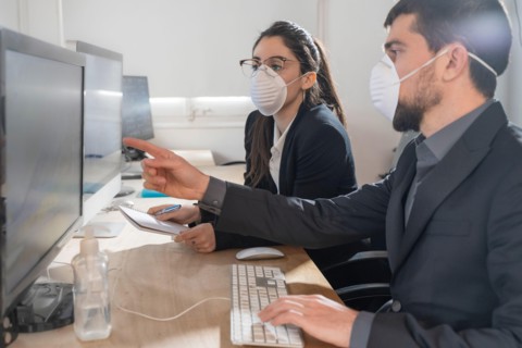 Coronavirus Office workers with mask for corona virus. Business workers wear masks to protect and take care of their health.