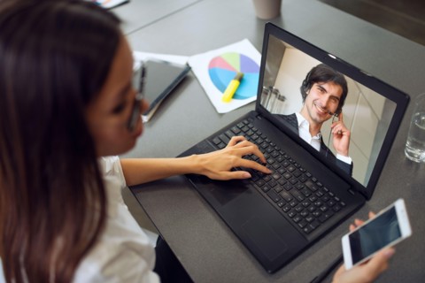 Businessman is working in remote with a videocall due to quarantine of coronavirus covid19. Concept of smart working