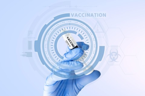 Syringe with the inscription "Vaccine". Coronavirus vaccination