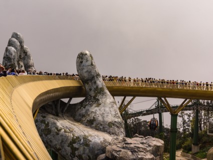 Ba Na Hills, Danang/Vietnam-02/25/2019: the newly opened Golden Bridge supported by a pair of giant hands at the summit of Ba Na Hills