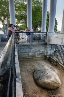 Plymouth Rock Portico containing the Plymouth Rock, the stone onto which the Mayflower Pilgims disembarked in 1620. Massachusett