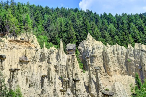 Earth Pyramids can be found in Ritten, above Bolzano, near Klobenstein, Oberbozen, and Unterinn; or  Platten near Percha in the Puster Valley.