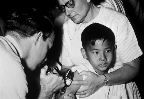 A jet injector gun being used during mass smallpox immunization procedures. Vaccinia vaccine is a highly effective immunizing agent that brought about the global eradication of smallpox, 1972. Because...