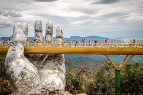The Golden Bridge /Vietnamese: C?u Vàng) is a pedestrian bridge located in the Sun World resort in Bà Nà Hills near Da Nang in Vietnam.