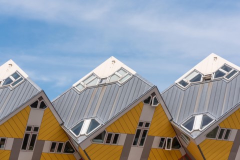 Rotterdam, Netherlands - April 23, 2019 : Yellow Cube houses - Kubuswoningen - in Blaak station area famous landmark of the city