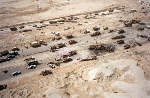 Destroyed Iraqi armored vehicles litter Highway 80, known as the Highway of Death destroyed by coalition aircraft during the Gulf War February 28, 1991 in Kuwait.