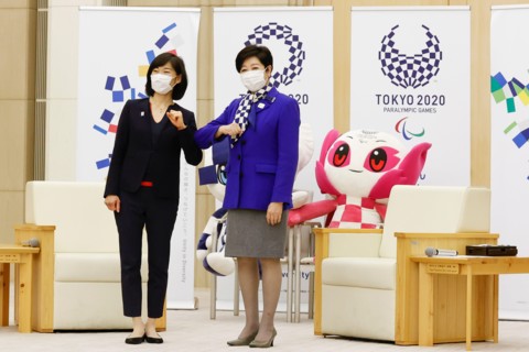Tokyo, Japan. 19th Feb, 2021. (L to R) Minister for the Tokyo Olympic and Paralympic Games Tamayo Marukawa and Tokyo Governor Yuriko Koike bump elbows at the Tokyo Metropolitan Government building. Ko...