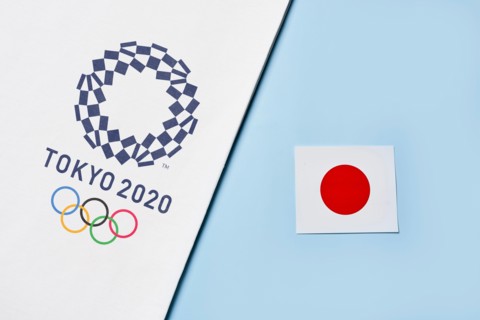 Tashkent, Uzbekistan - March 4, 2021: 2020 A towel with TOKYO 2020 Olympic games logotype and national flag of Japan