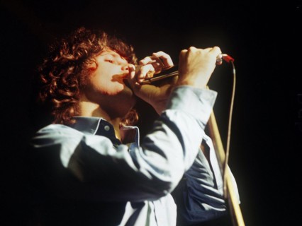 An undated file picture shows 'The Doors' singer Jim Morrison during a concert. Jim Morrison is supposed to be pardoned from the accusal of having denuded in public during a concert, by the parting go...