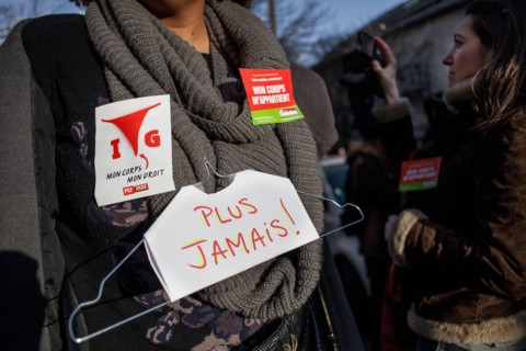 Paris, France. 1st Feb, 2014. Demonstration for the right to abortion in Spain in Paris, on February 1, 2014. The march went until the front of the Spanish ambassy where people had left their hangers....