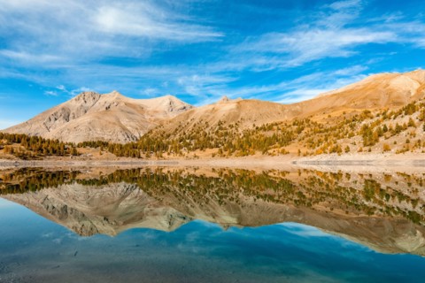 France - Provence - Haut Verdon - Mont Pelat is reflected in Lac Allos.