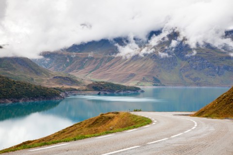 Curving road beside Lac du Mont Cenis, Savoie, France