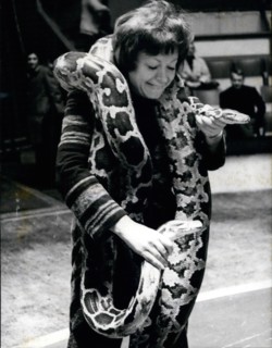 Apr. 04, 1970 - Regine as snake charmer: Regine, the famous French singer entertainer is back in Paris after a singing tour in America. She will participate in the annual charity show organised by the...