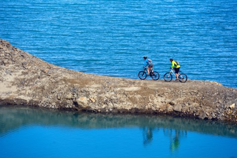 Mountain biking around Alp lake Lac du Mont Cenis, France, Savoie