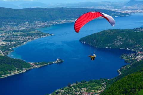 paragliding over the lake Annecy, France, Haute-Savoie