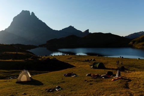 Hiking and tents, around the Ayous lakes, Gentau lake and Pic du Midi d'Ossau, Ayous lakes route, Pyrenees mountains, France, Eu