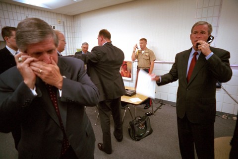 U.S. President George W. Bush and White House Chief of Staff Andy Card make phone calls after hearing news of the September 11 terrorist attacks during a visit to the Emma E. Booker Elementary School ...