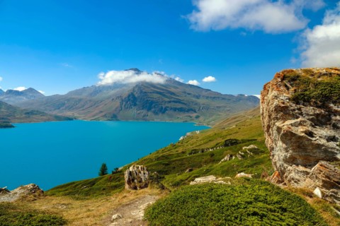 Col de Mont Cenis mountain pass between France and Italy with large lake, reservoir,