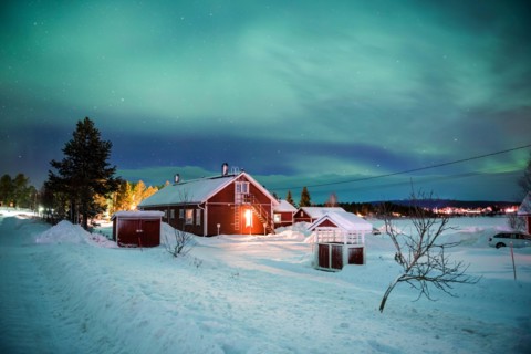Northern Lights (aurora borealis) over Akaslompolo, a small town in Finnish Lapland, inside Arctic Circle in Finland