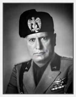 Benito Mussolini World War II 1940 studio portrait in uniform. 
(1883–1945) 1940 Benito Amilcare Andrea Mussolini, who went by the nickname “Il Duce” (“the Leader”), was an Italian dictator who create...