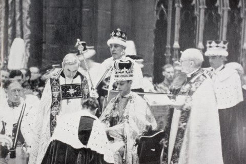 King George VI receives the homage of princes and peers following his coronation in 1937.