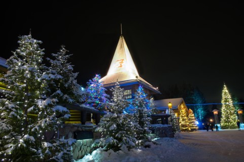 Santa Claus Village in Finland surrounded by Christmas trees