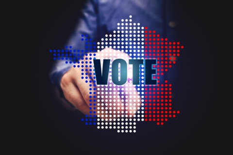 Elections in france with man pointing vote text.