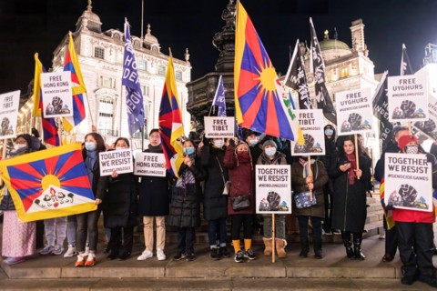 London, UK. 10th Dec, 2021. Protesters seen holding placards and flags during the protest. In celebration of the Human Rights Day (10th Dec), various anti-Chinese Communist Party (anti-CCP) groups in ...