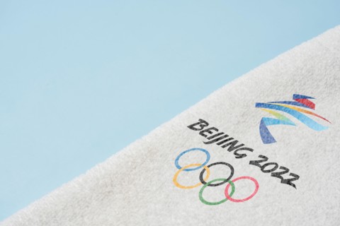 14 December 2021 - Los Angeles, USA: Beijing 2022 Winter Olympic Games and towel. International sport event. Winter Olympics 2022 in Beijing, China