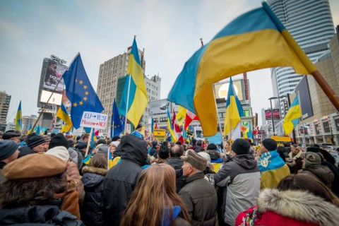 TORONTO - DECEMBER 15: Hundreds gather to protest for Ukraine on December 15, 2013 at Yonge - Dundas Square in Toronto, Canada.