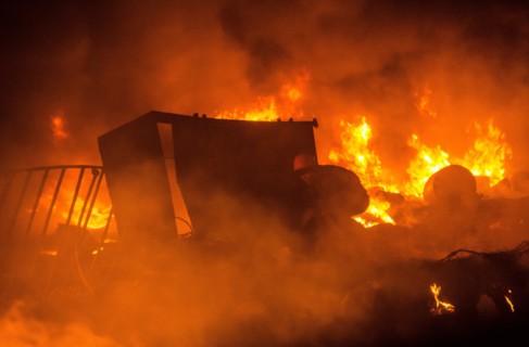 Feb. 19, 2014 - Kiev, Ukraine- February 20, 2014: A barricade is created by protesters made of burning objects. More than 10,000 protesters in Independence Square, Kiev. Regardless of the stage declar...