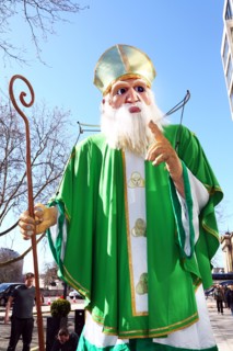 London, UK. 16th March 2014. A giant figure of St. Patrick takes part in the St. Patrick's Day Parade 2014 in London, England Credit:  Paul Brown/Alamy Live News