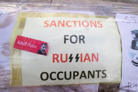 Westminster London , UK. 22nd March 2014. Ukranian protesters continue to hold a 24 hour shift protest outside Downing following the Military intervention and annextaion of Crimea by Russian forces, C...