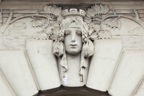 Allegorical mascaron dedicated to European Railways on the Art Nouveau building of the Main Railway Station in Prague, Czech Rep