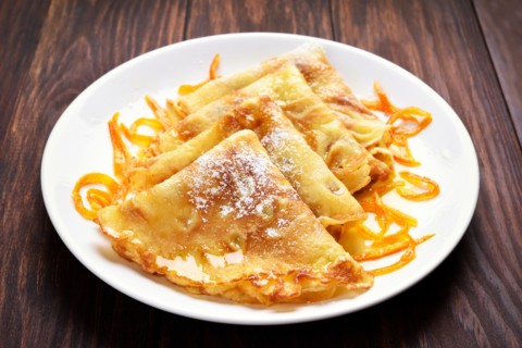 Crepes pancakes with orange sauce